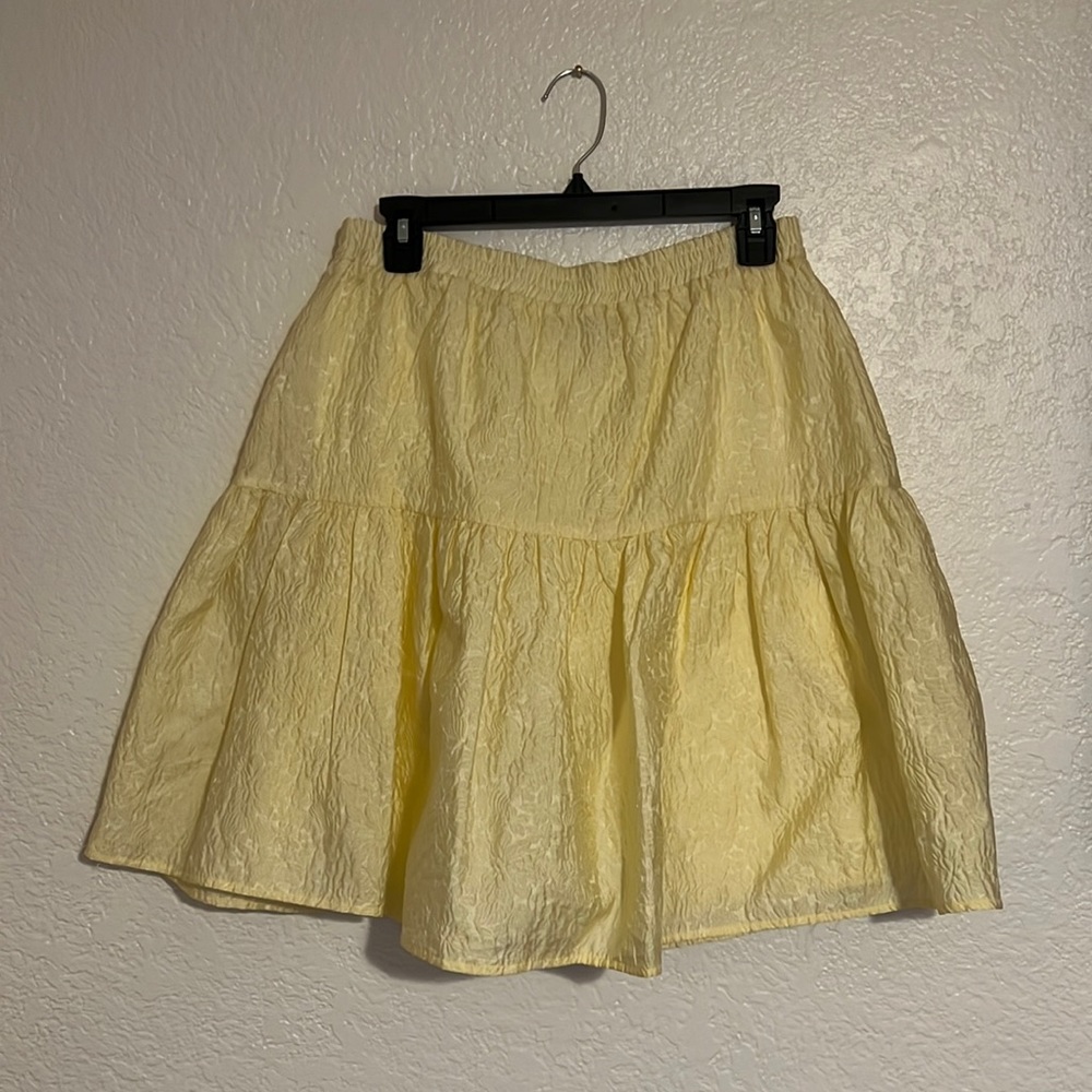 Soft pastel yellow tiered brocade mini skirt